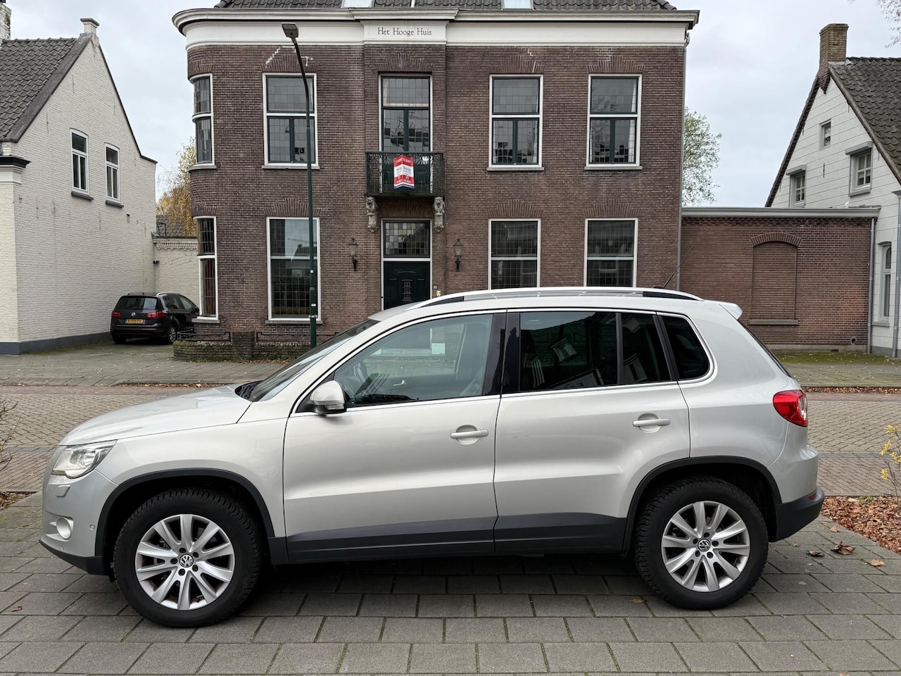 Volkswagen Tiguan - 2.0 TSI Sport&Style 4Motion AUTOMAAT - AutoWereld.nl