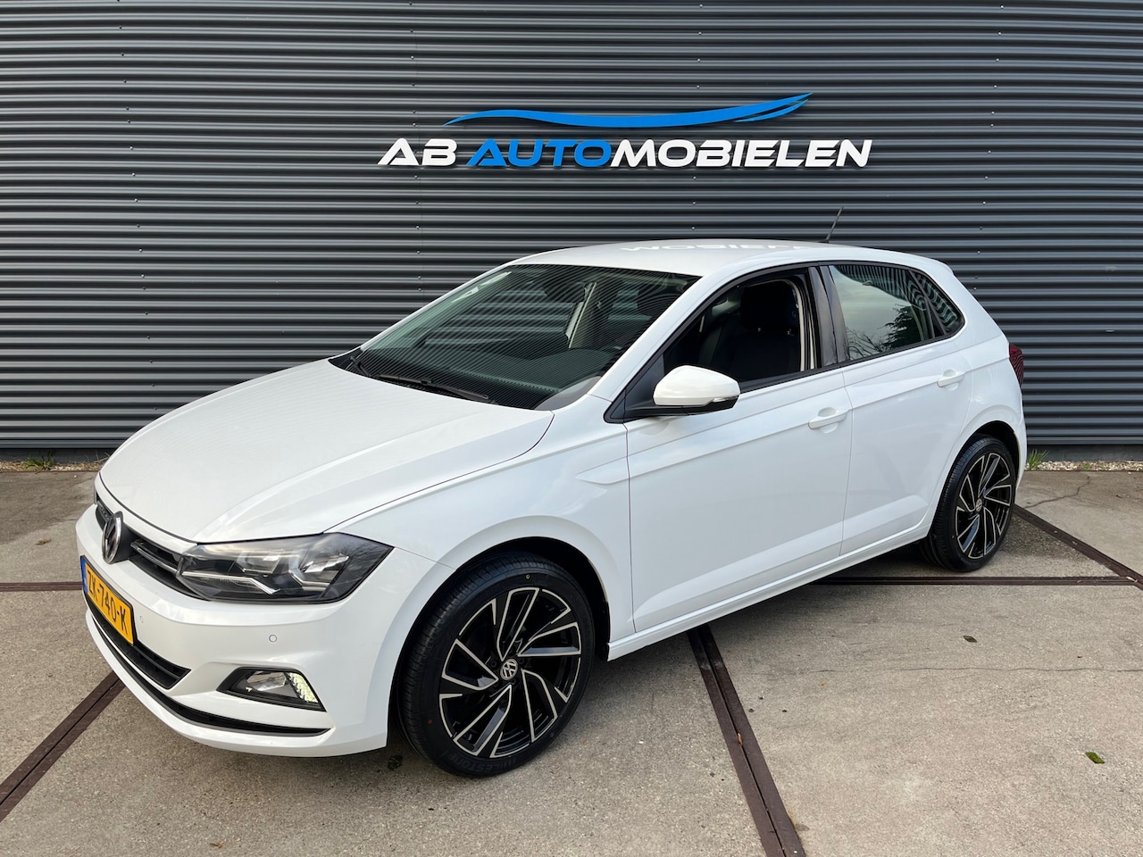 Volkswagen Polo - 1.0 TSI Comfortline PARKEER SENSOREN/ NAVI - AutoWereld.nl