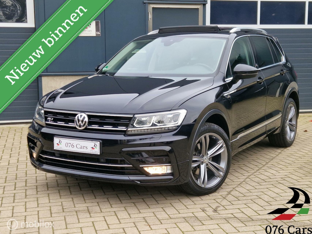 Volkswagen Tiguan - 1.4 TSI ACT R-LINE / PANO / CAMERA / TREKHAAK / VIRTUAL COCKPIT / 1e EIGENAAR / - AutoWereld.nl