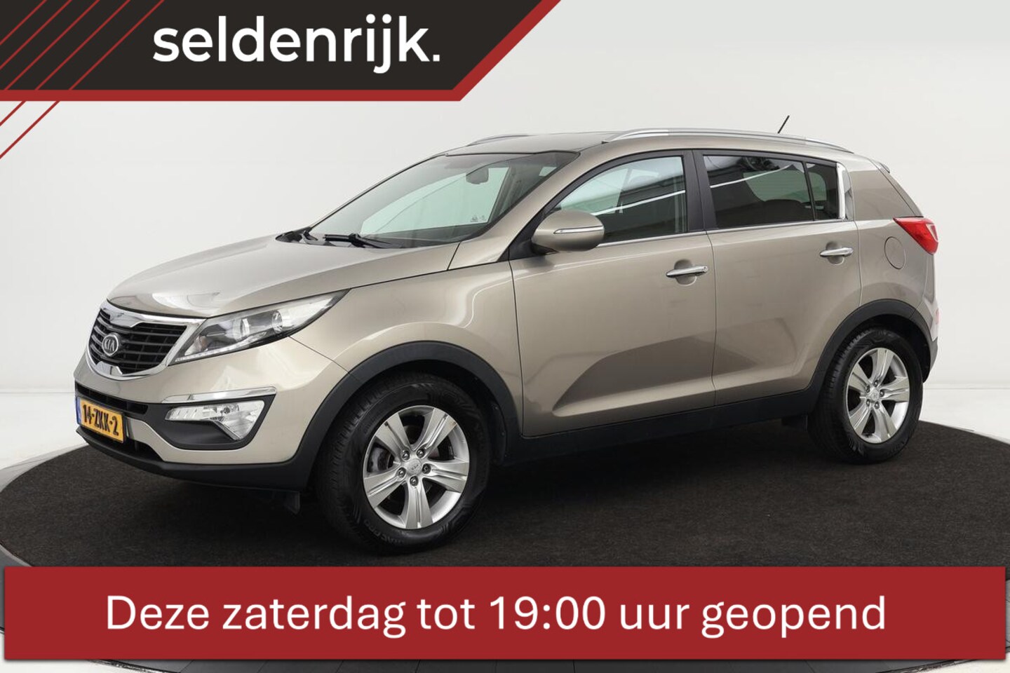 Kia Sportage - 2.0 X-ecutive Plus Pack | Trekhaak | Half leder | PDC | Climate control | Cruise control - AutoWereld.nl