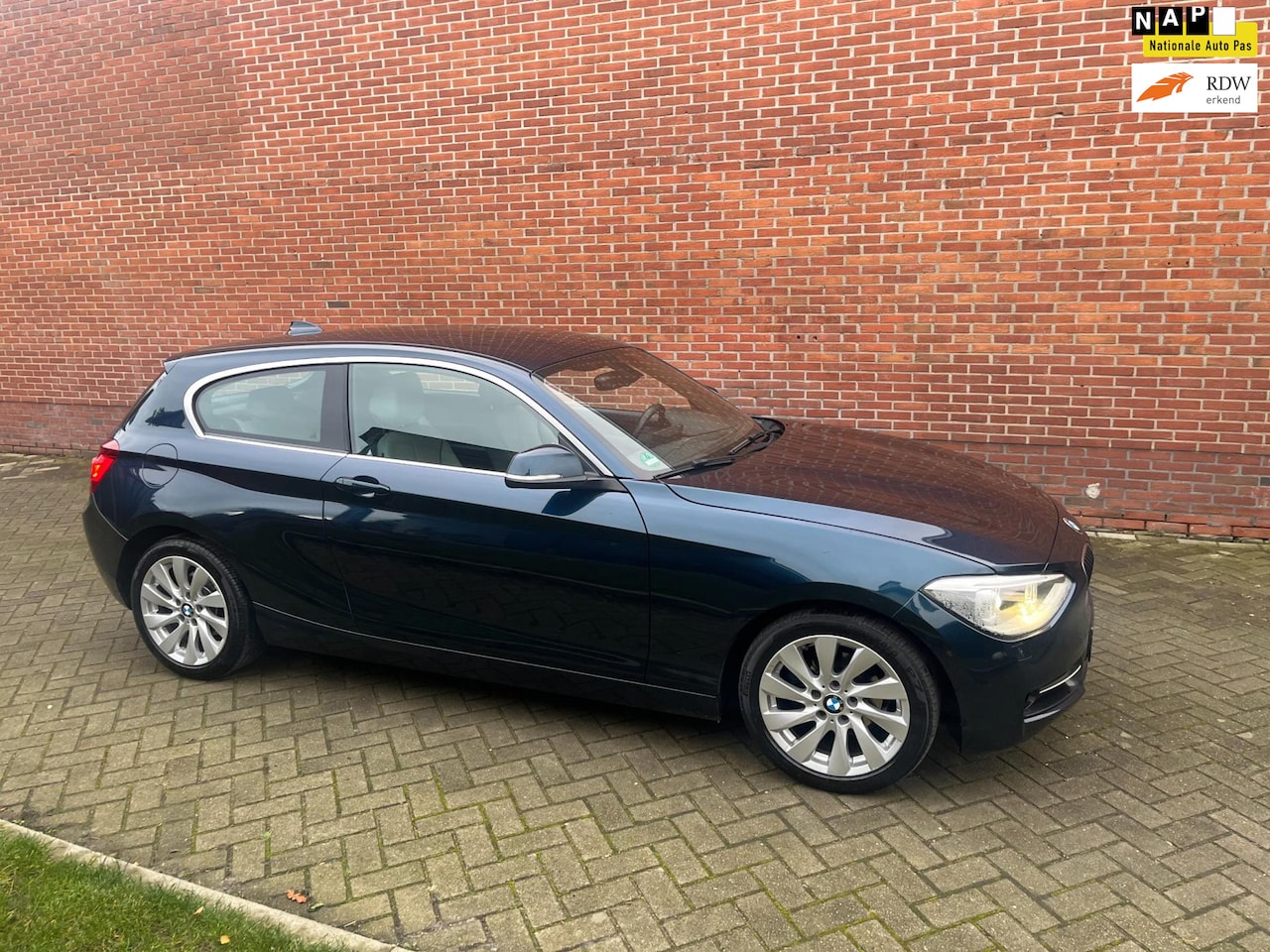 BMW 1-serie - 118d High Executive Leder Navi Xenon - AutoWereld.nl