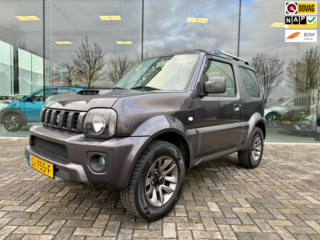 Suzuki Jimny - 1.3 16V 4X4 Rhino, Leder, Schuif- Panoramadak, Airco - AutoWereld.nl