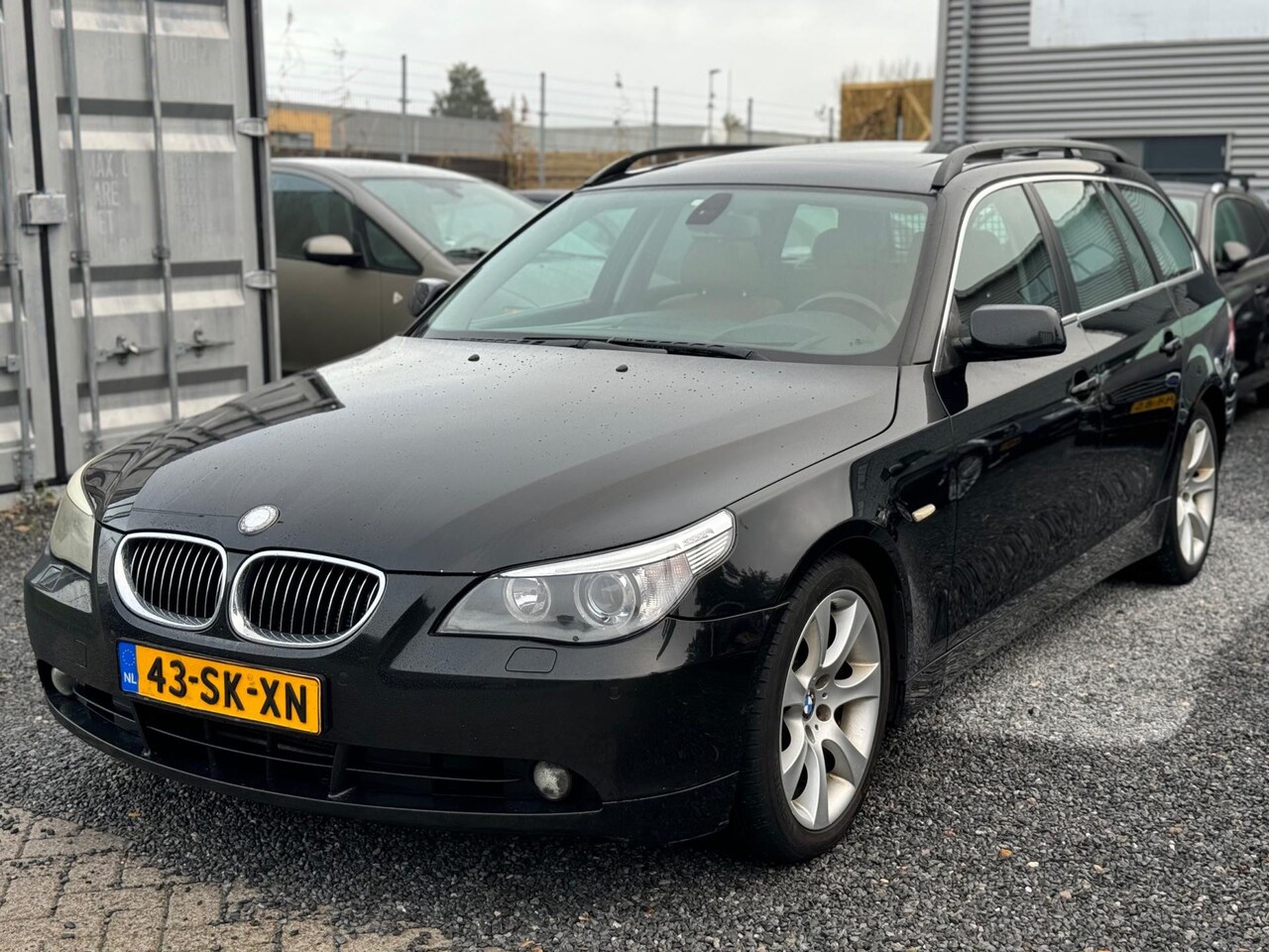 BMW 5-serie Touring - 525i Business Line Clima Pano Leer Headup - AutoWereld.nl