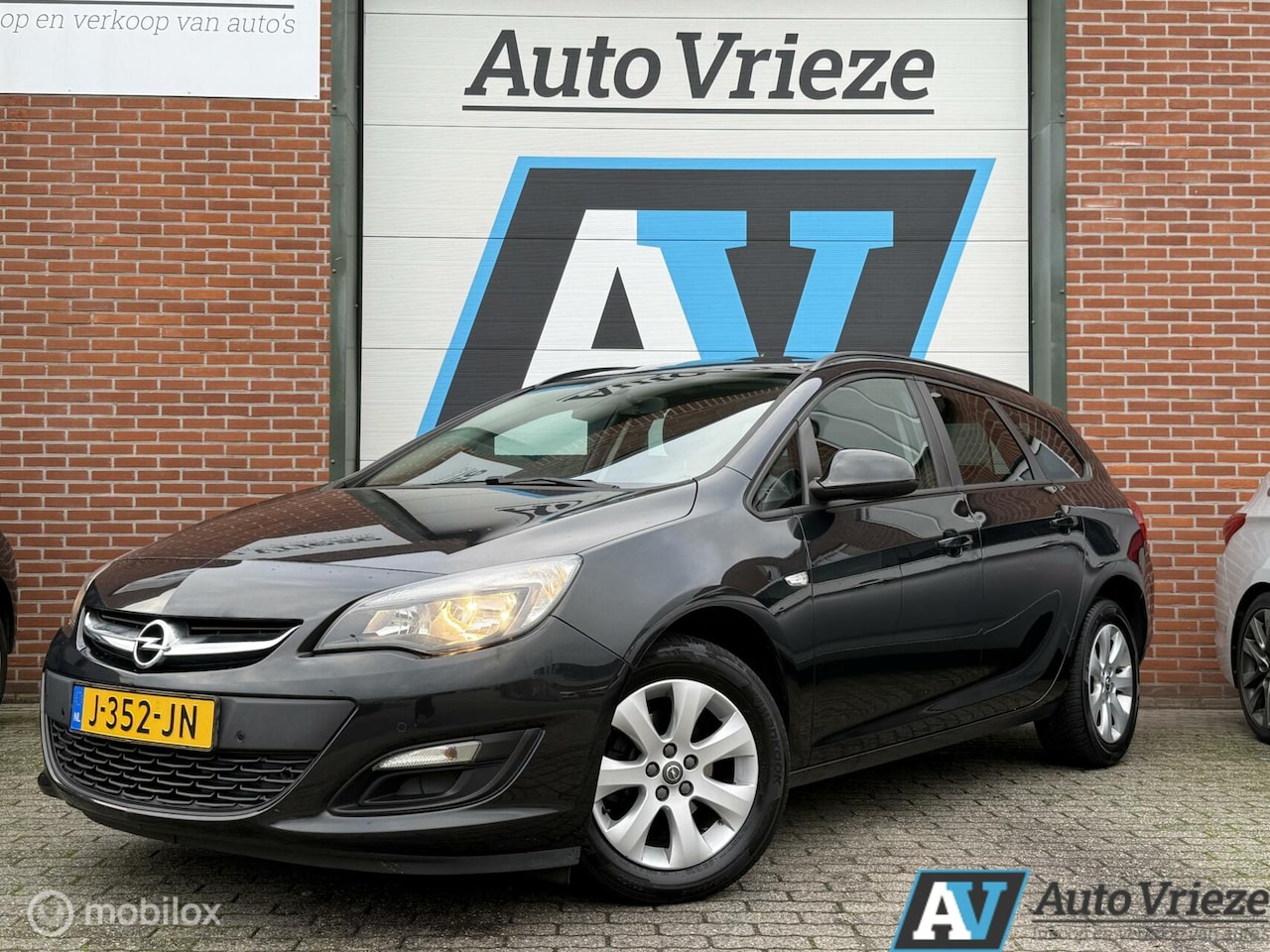 Opel Astra Sports Tourer - 1.4 Turbo Cosmo 1.4 Turbo Cosmo, Stoelverwarming - AutoWereld.nl