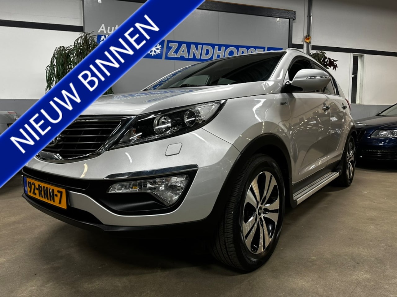 Kia Sportage - 2.0 X-clusive 4wd 2.0 X-clusive 4wd - AutoWereld.nl