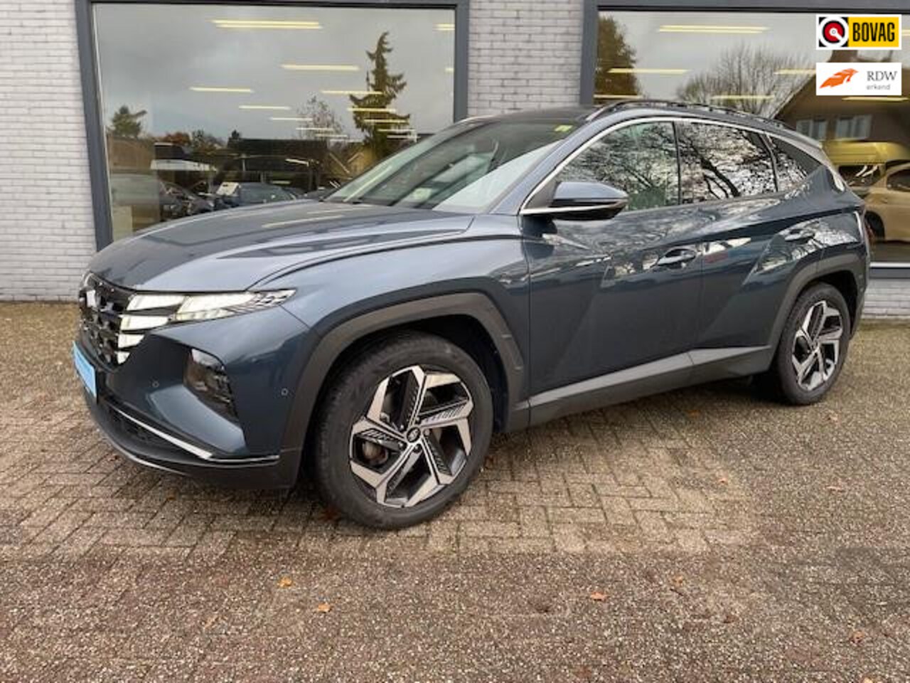 Hyundai Tucson - 1.6 T-GDI PHEV Premium Sky 4WD|beige leder|stoelkoeling|panoramadak|plug in - AutoWereld.nl