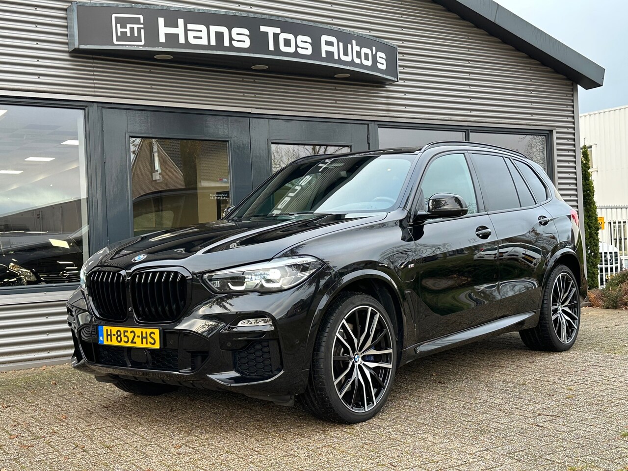 BMW X5 - XDrive45e M-Sport / skylounge panorama / 22” / HUD - AutoWereld.nl