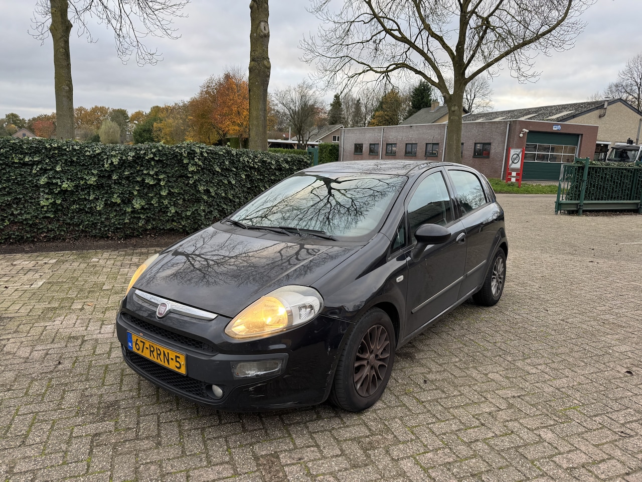 Fiat Punto Evo - 1.3 M-Jet Racing Airco - AutoWereld.nl