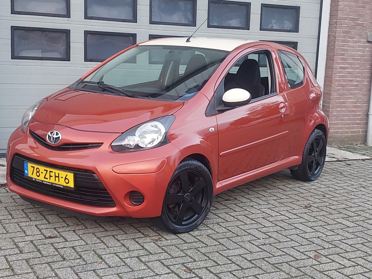 Toyota Aygo - 1.0 VVT-i Comfort Orange/White Airco - AutoWereld.nl