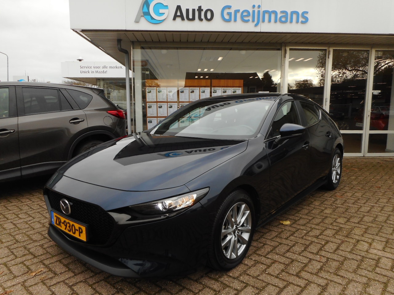 Mazda 3 - 2.0 e-SkyActiv-G M Hybrid 122 Comfort met Bose - AutoWereld.nl