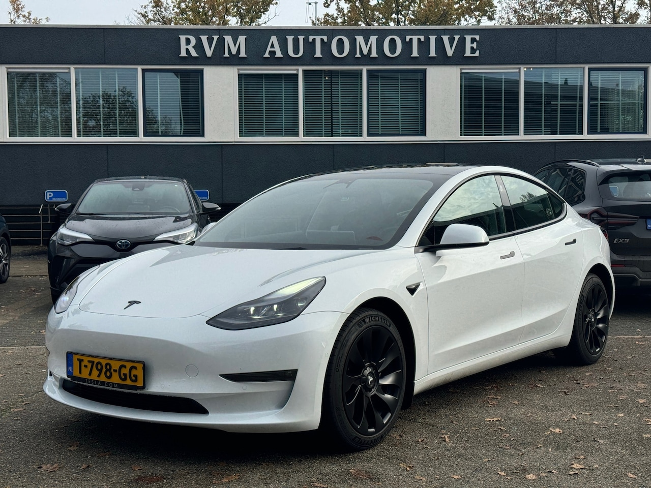 Tesla Model 3 - Long Range RWD Long Range AWD 75 kWh VOLLEDIGE FABR. GARANTIE t/m 03-2026 of 80.000km - AutoWereld.nl