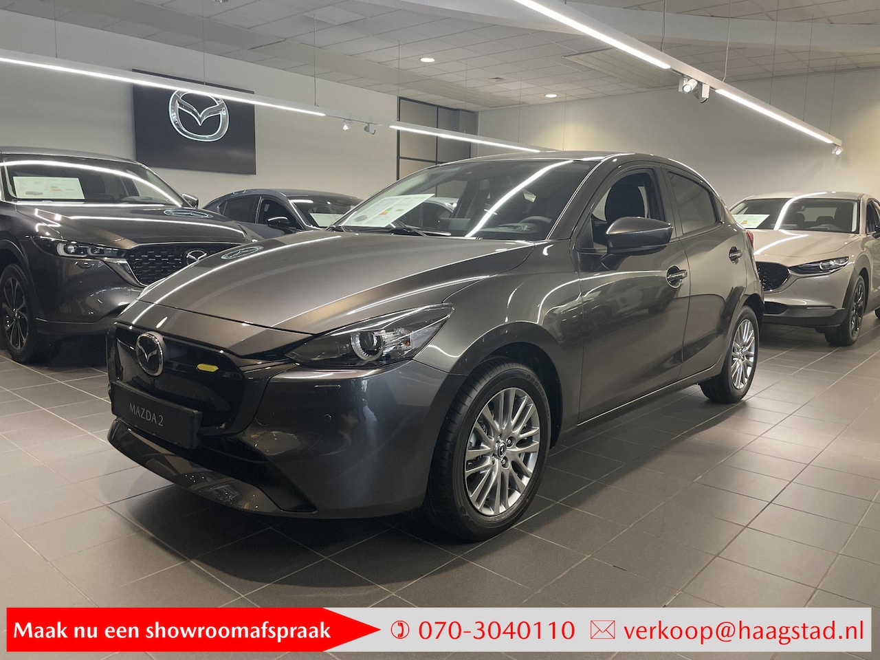 Mazda 2 - 1.5 e-SkyActiv-G 90 Exclusive-Line Haagstad Netto Deal / Van: €29740 Voor: €26950 - AutoWereld.nl