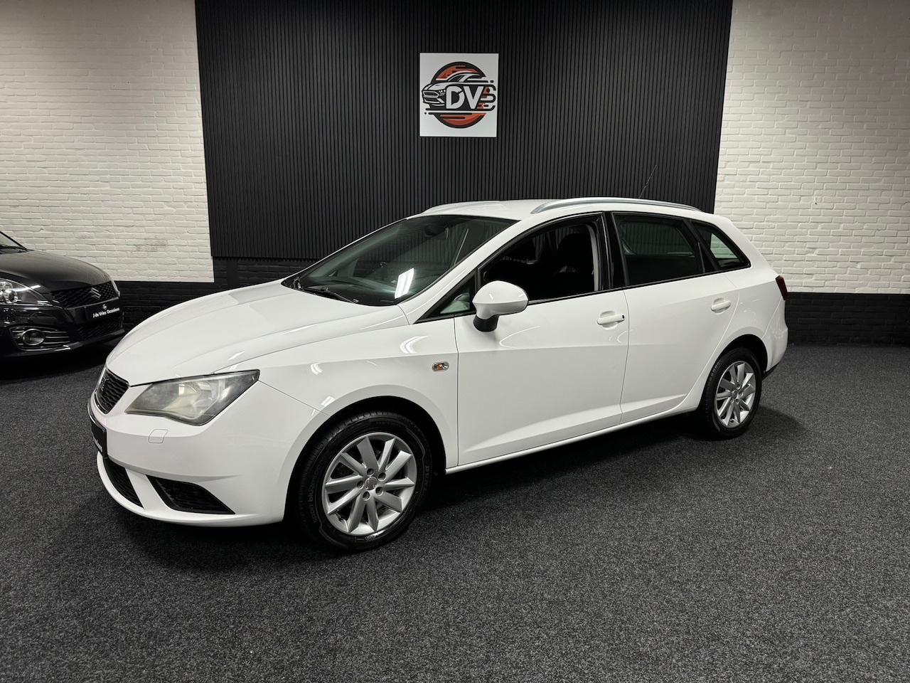 Seat Ibiza ST - 1.4 SPORT, NAV, CR CTR, STL VERW, AUTO AIRCO, ELEK PAKKET, PDC ACHTER - AutoWereld.nl