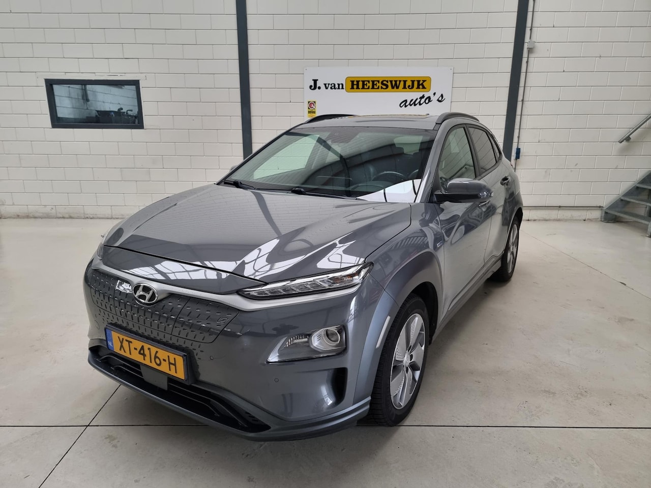 Hyundai Kona Electric - EV Premium 64 kWh Ecc | Schuifdak | lmv |Keyless | Head up - AutoWereld.nl