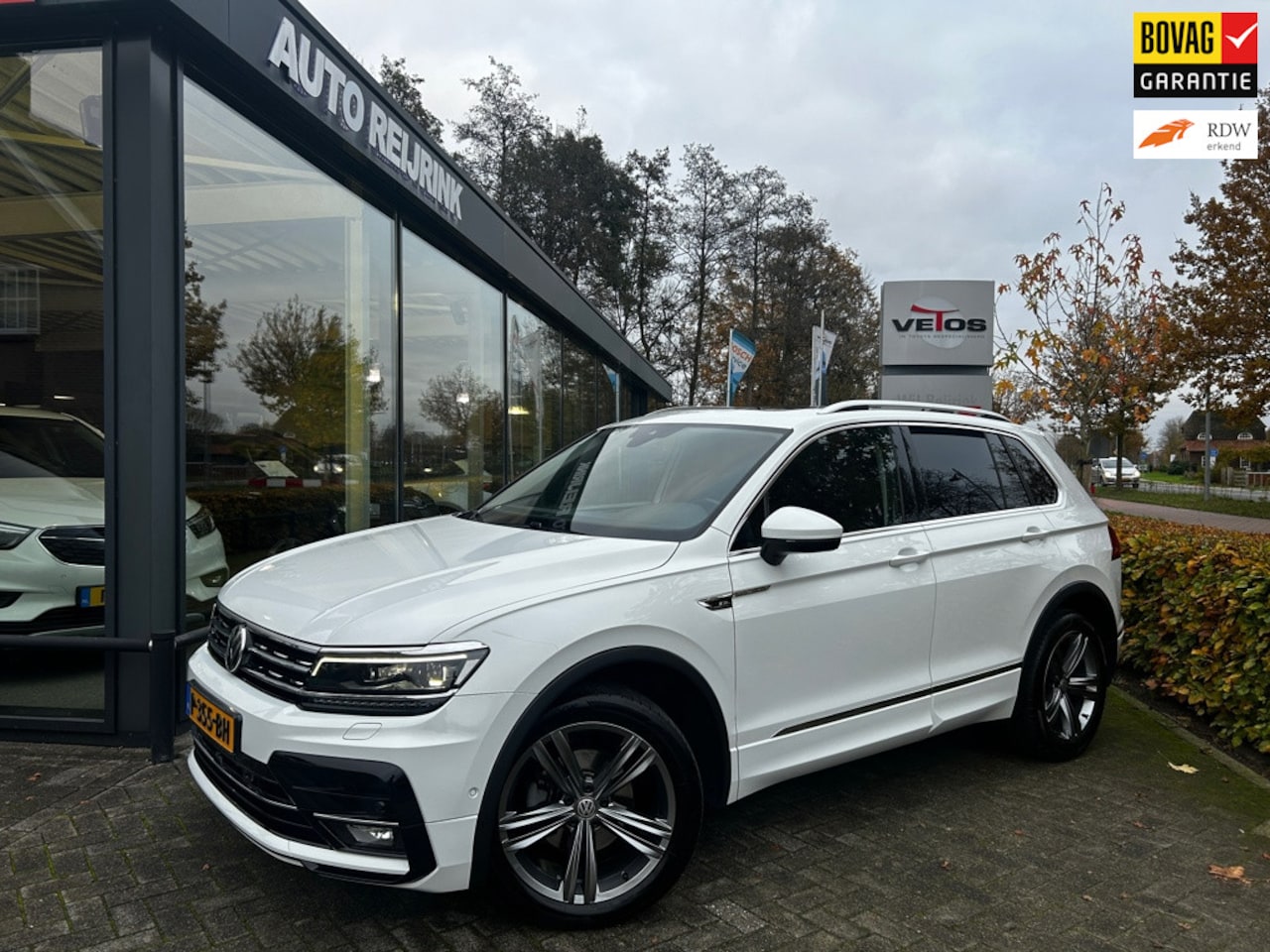 Volkswagen Tiguan - 1.4 TSI 4Motion Highline Business R 1.4 TSI 4Motion Highline Business R, glas coating, panoramadak - AutoWereld.nl