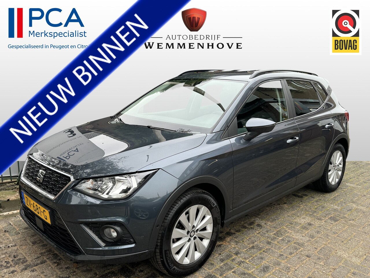 Seat Arona - 1.0 TSI Style Business Intense Airco/Alu wielen/Navi/Mistl/Camera - AutoWereld.nl