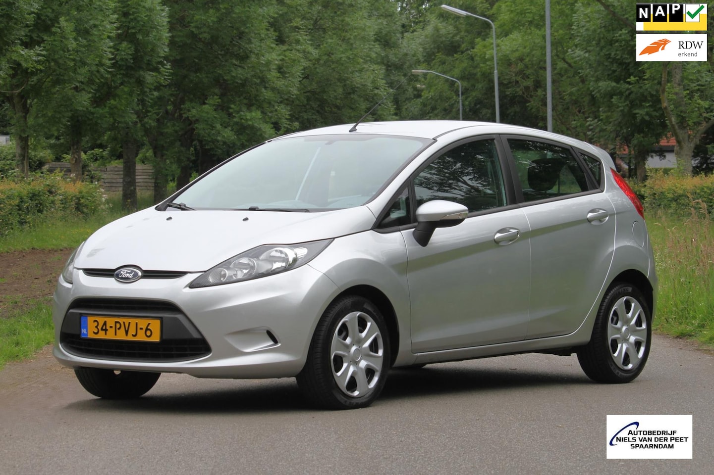 Ford Fiesta - 1.25 Limited 5 deurs / Airco / Elektrische ramen / Splinternieuwe koppeling! - AutoWereld.nl