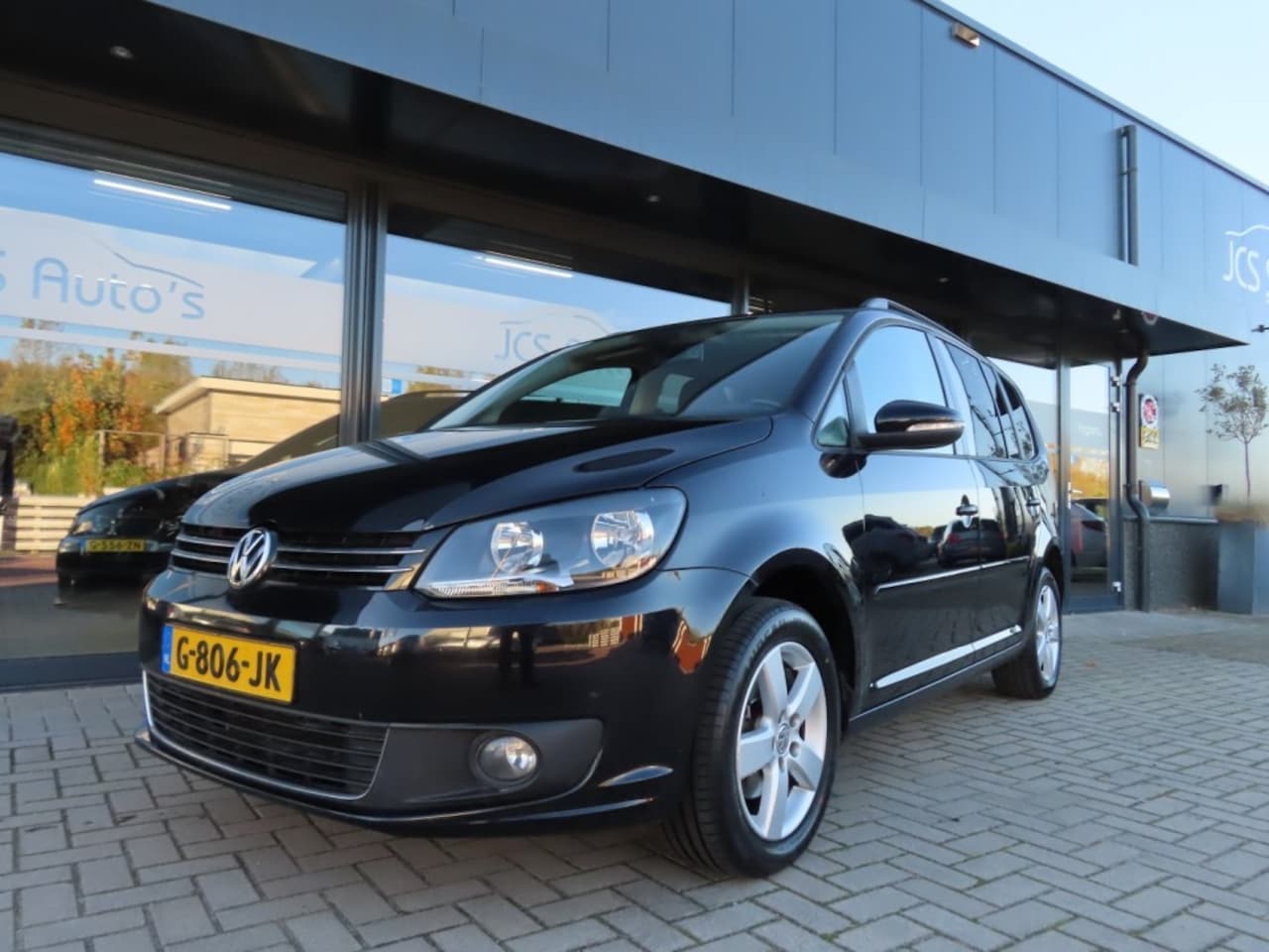 Volkswagen Touran - 1.2 TSI Ecc Cruise Navi Pdc 7 Pers 2012 - AutoWereld.nl