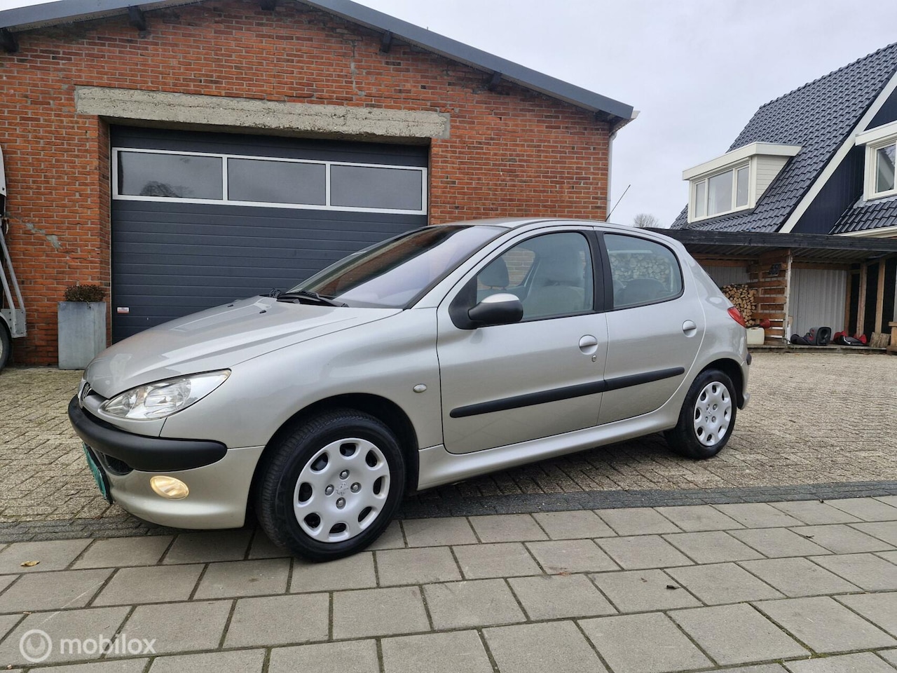 Peugeot 206 - 1.4-16V 91000 km!! - AutoWereld.nl