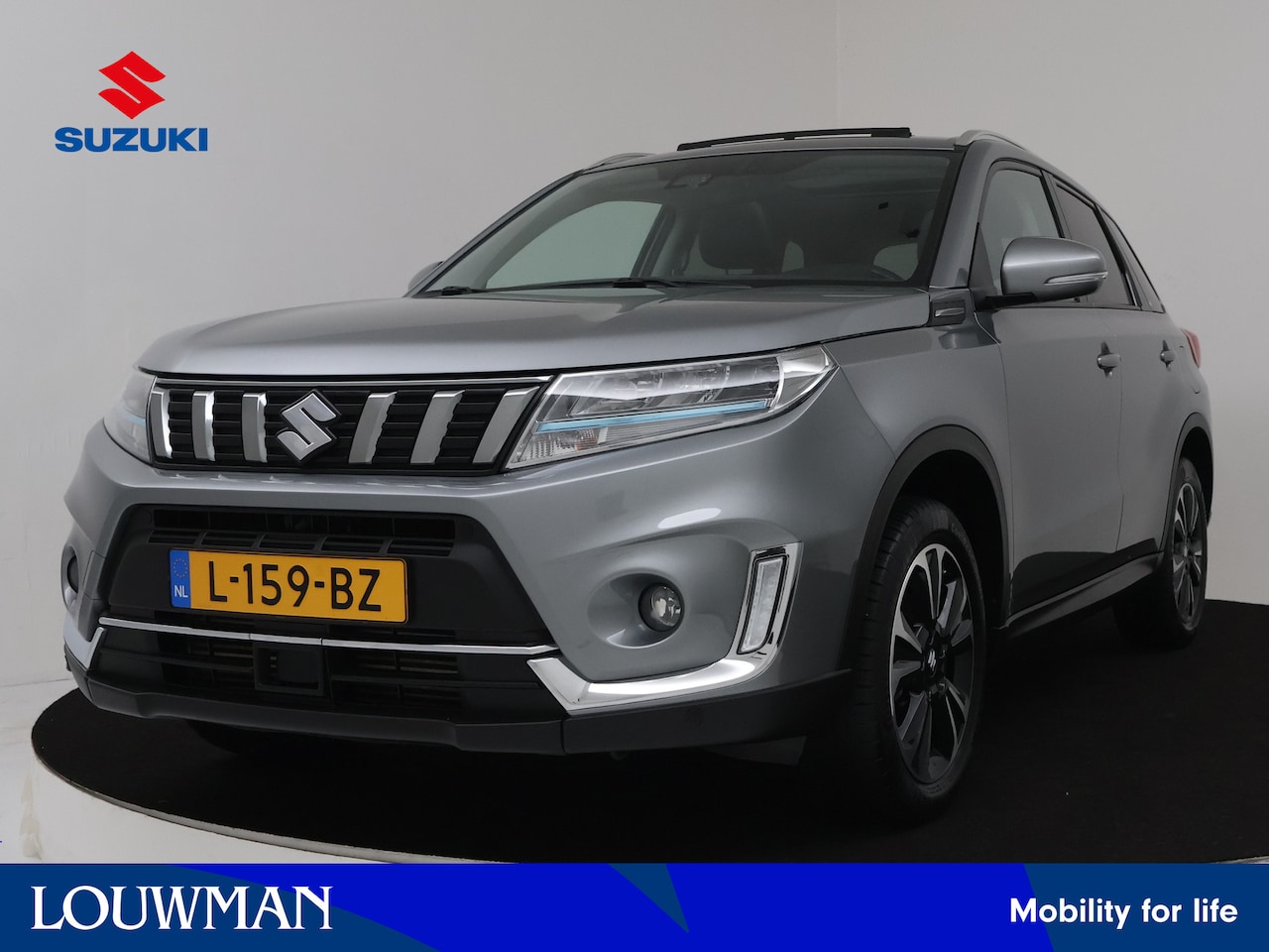 Suzuki Vitara - 1.4 Boosterjet Style Smart Hybrid | Navigatie | Camera | Panoramadak | LM velgen | Stoelve - AutoWereld.nl