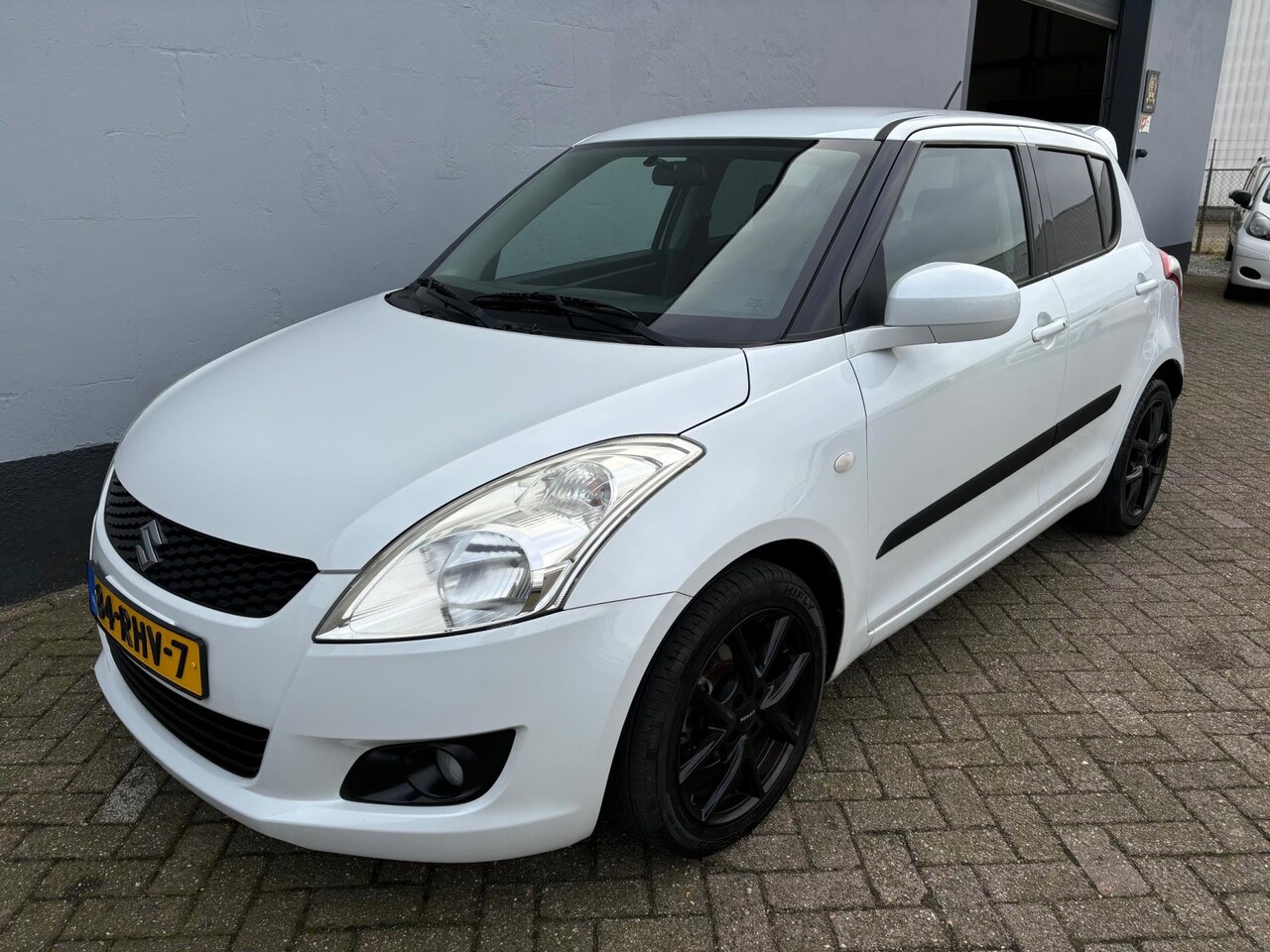 Suzuki Swift - 1.2 Exclusive EASSS - 1e Eigenaar - Cruise Control - AutoWereld.nl