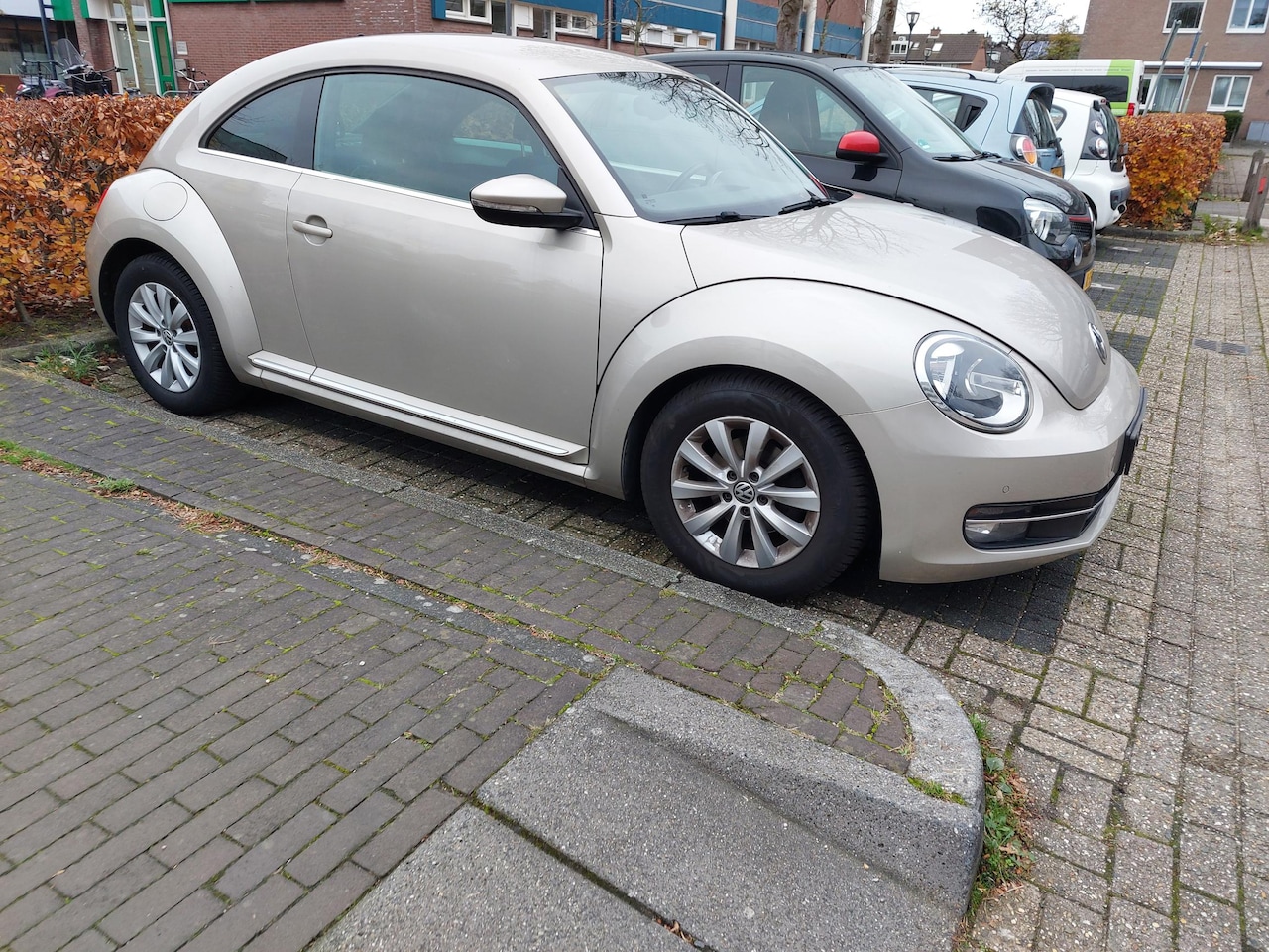 Volkswagen Beetle - 1.2 TSI Design nav/climat/cruise control/stoelverw - AutoWereld.nl