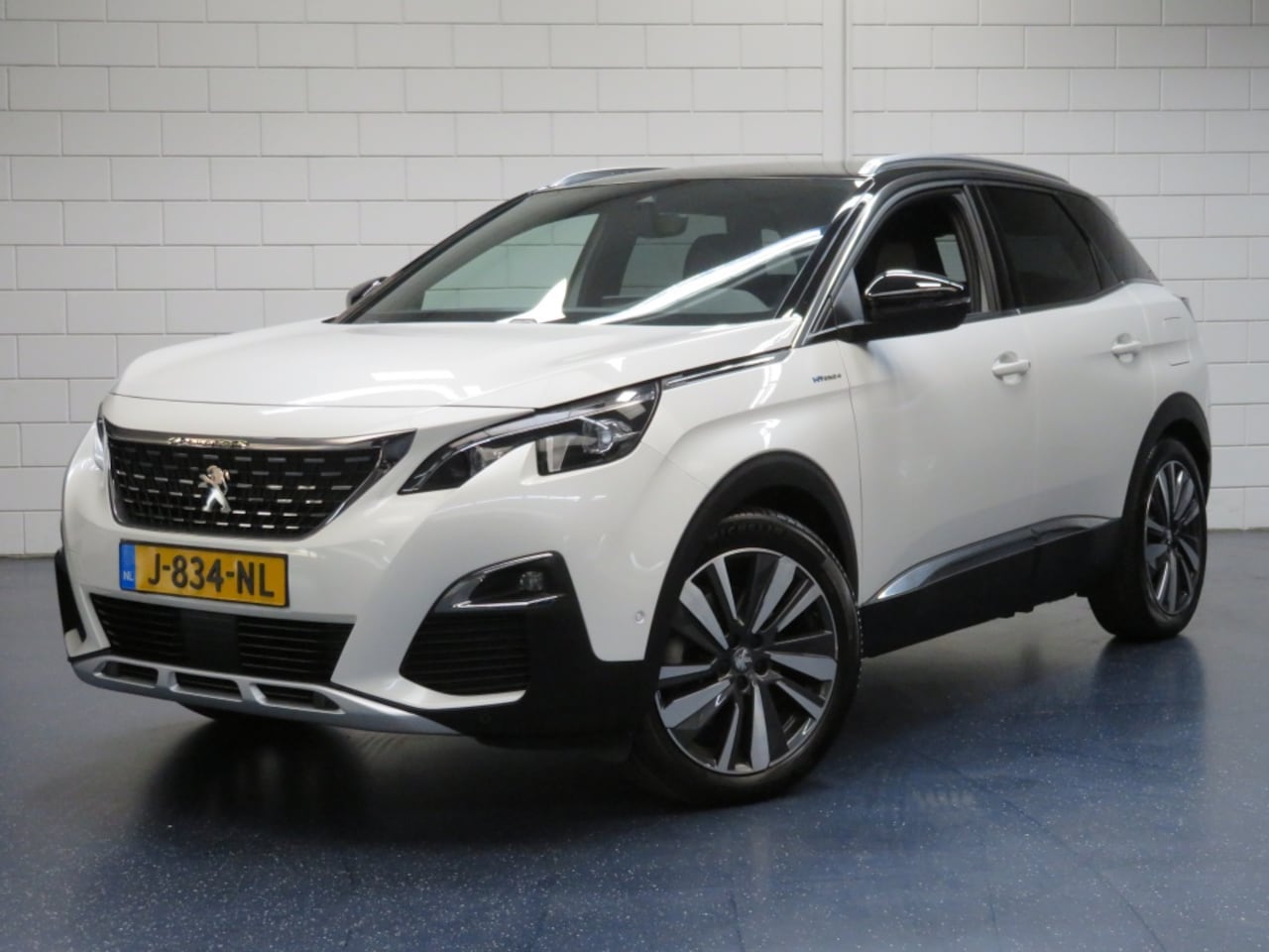 Peugeot 3008 - 1.6 HYbrid4 Première - AutoWereld.nl