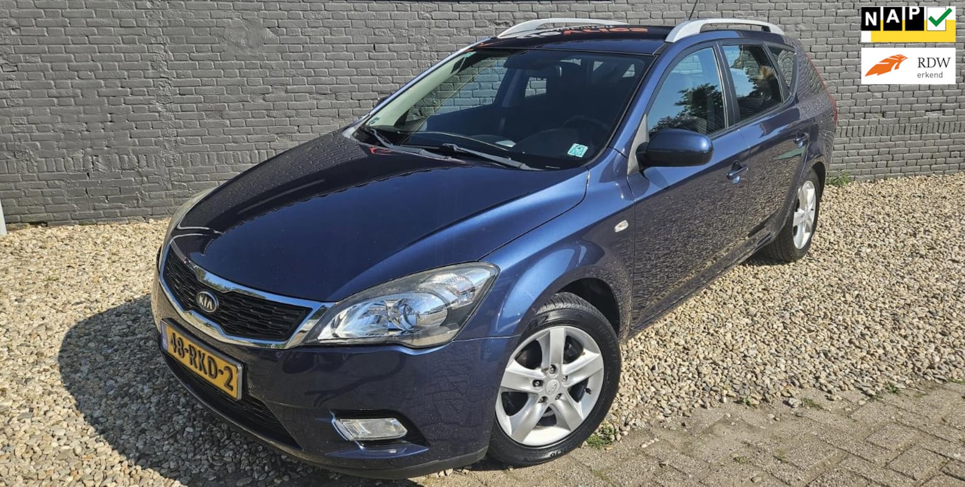 Kia Cee'd Sporty Wagon - 1.4 CVVT Seven 1.4 CVVT Seven - AutoWereld.nl