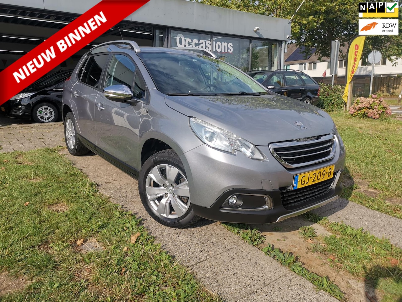 Peugeot 2008 - 1.2 PureTech Style AIRCO|NAVI|CRUISE|PDC|ELEC.RAMEN|NAP|APK - AutoWereld.nl