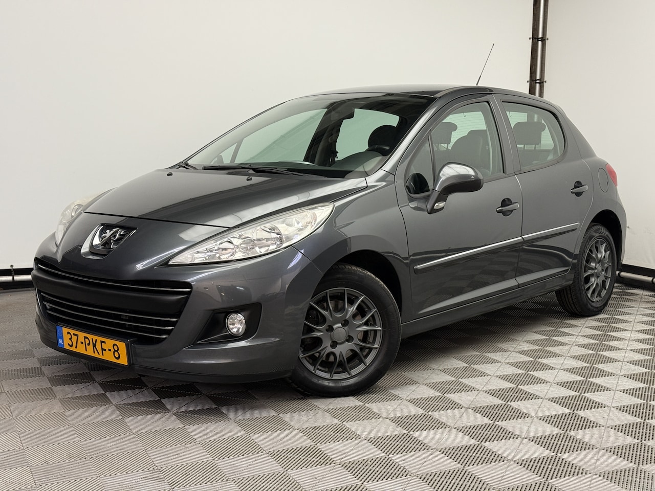 Peugeot 207 - 1.4 VTi Millesim 200 5-drs LM15" Cruise Airco NL Auto - AutoWereld.nl