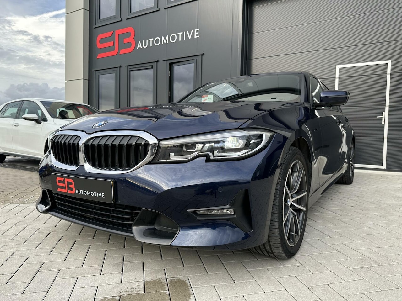 BMW 3-serie - 330e 292pk Aut 2020 Blauw - AutoWereld.nl