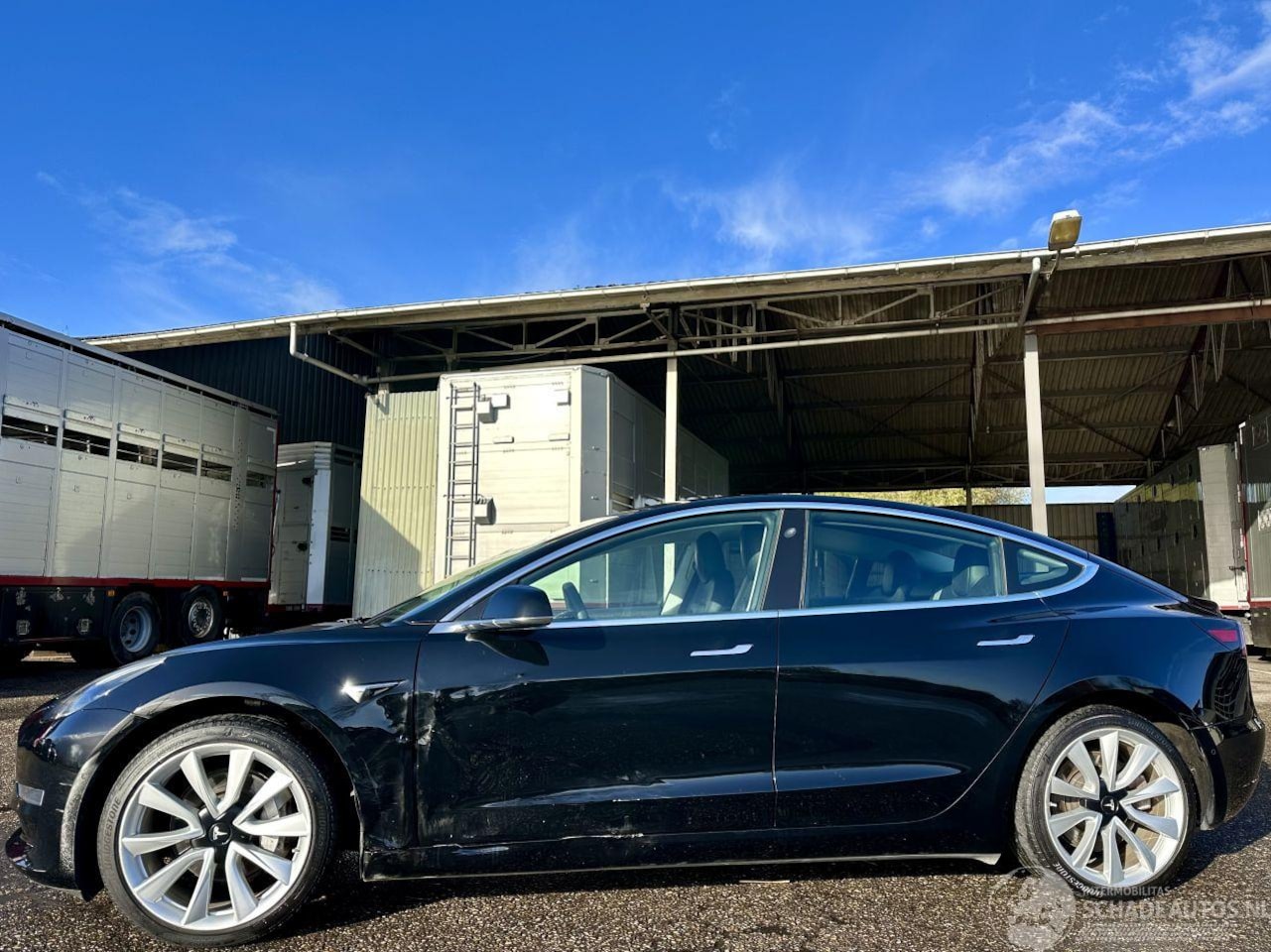 Tesla Model 3 - Long Range RWD Long Range AWD 75kWh 351pk aut - panoramadak - nap - navi - autopilot - camera - leer - st - AutoWereld.nl