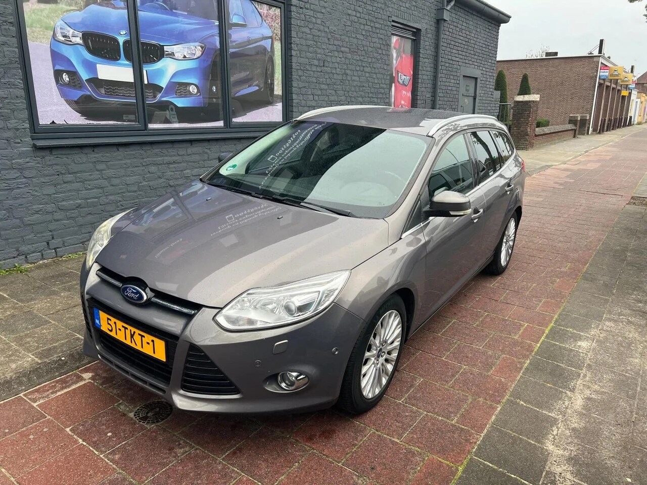 Ford Focus Wagon - 1.6 EcoBoost Titanium navi start/stop - AutoWereld.nl