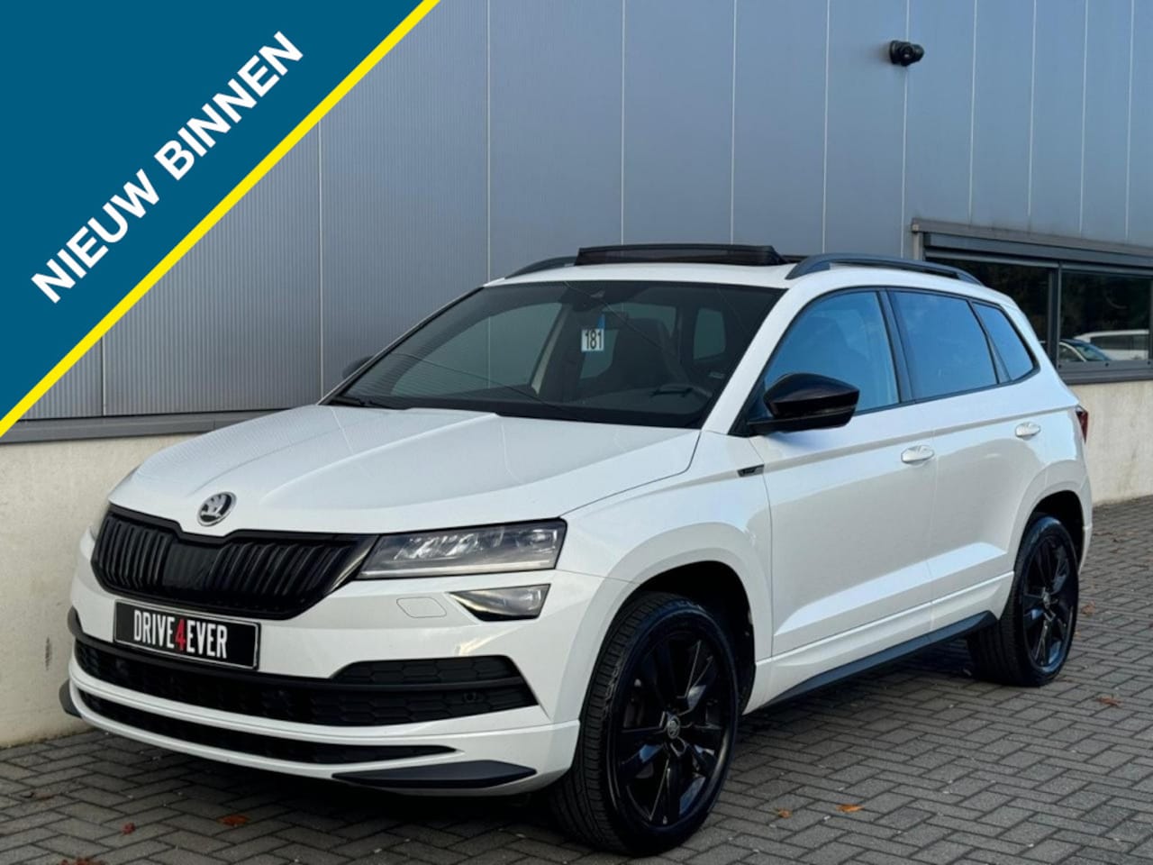 Skoda Karoq - 1.5 TSI Sportl. Bus. - AutoWereld.nl