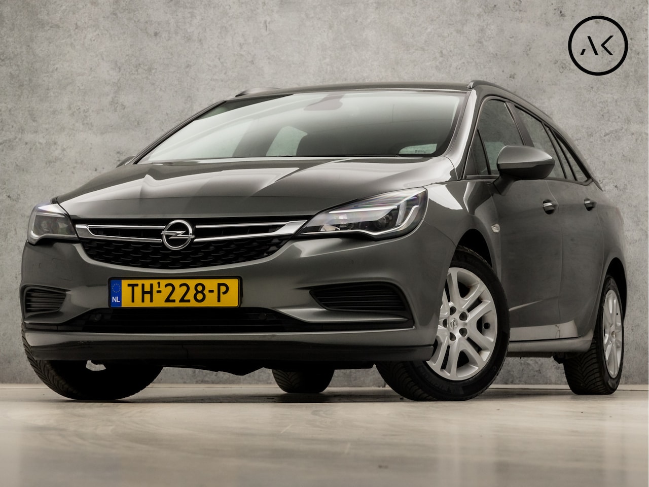 Opel Astra Sports Tourer - 1.0 Sportline (APPLE CARPLAY, GROOT NAVI, CRUISE, SPORTSTOELEN, PARKEERSENSOREN, ELEK PAKK - AutoWereld.nl