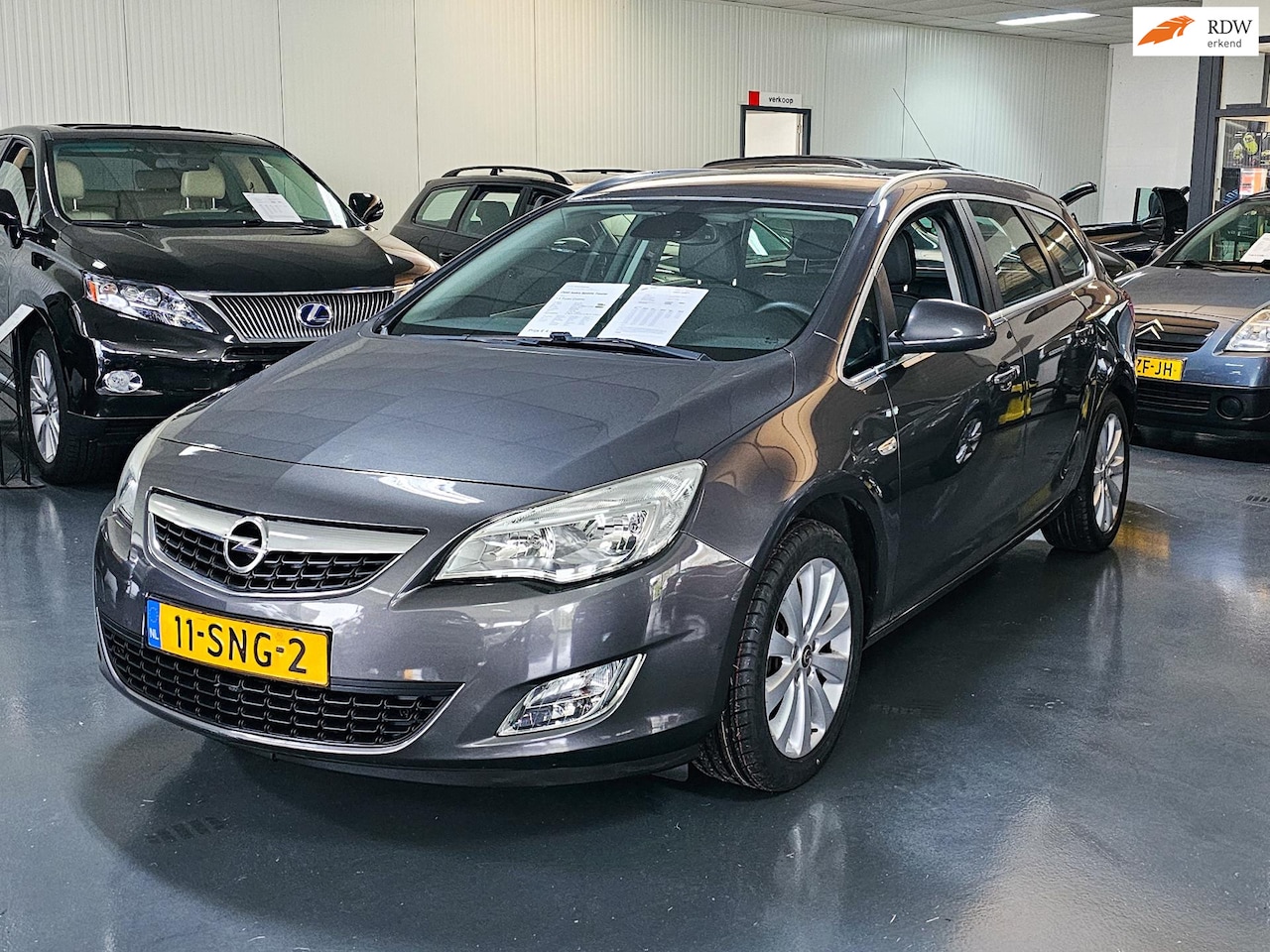 Opel Astra Sports Tourer - 1.4 Turbo Cosmo 1.4 Turbo Cosmo - AutoWereld.nl