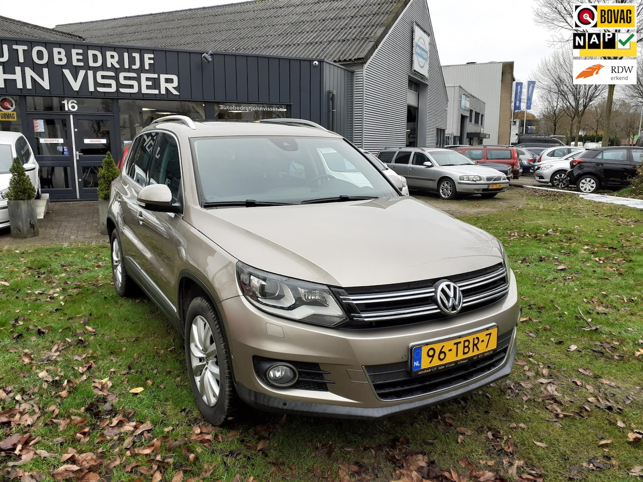 Volkswagen Tiguan - 1.4 TSI Sport&Style *trekhaak*panoramadak*leder*navi* - AutoWereld.nl