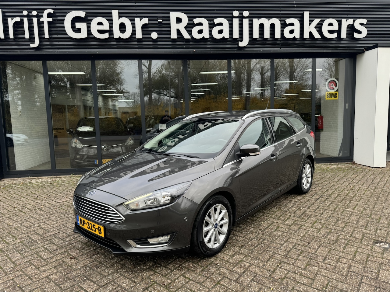 Ford Focus Wagon - 1.0 Titanium *Navigatie*ECC - AutoWereld.nl