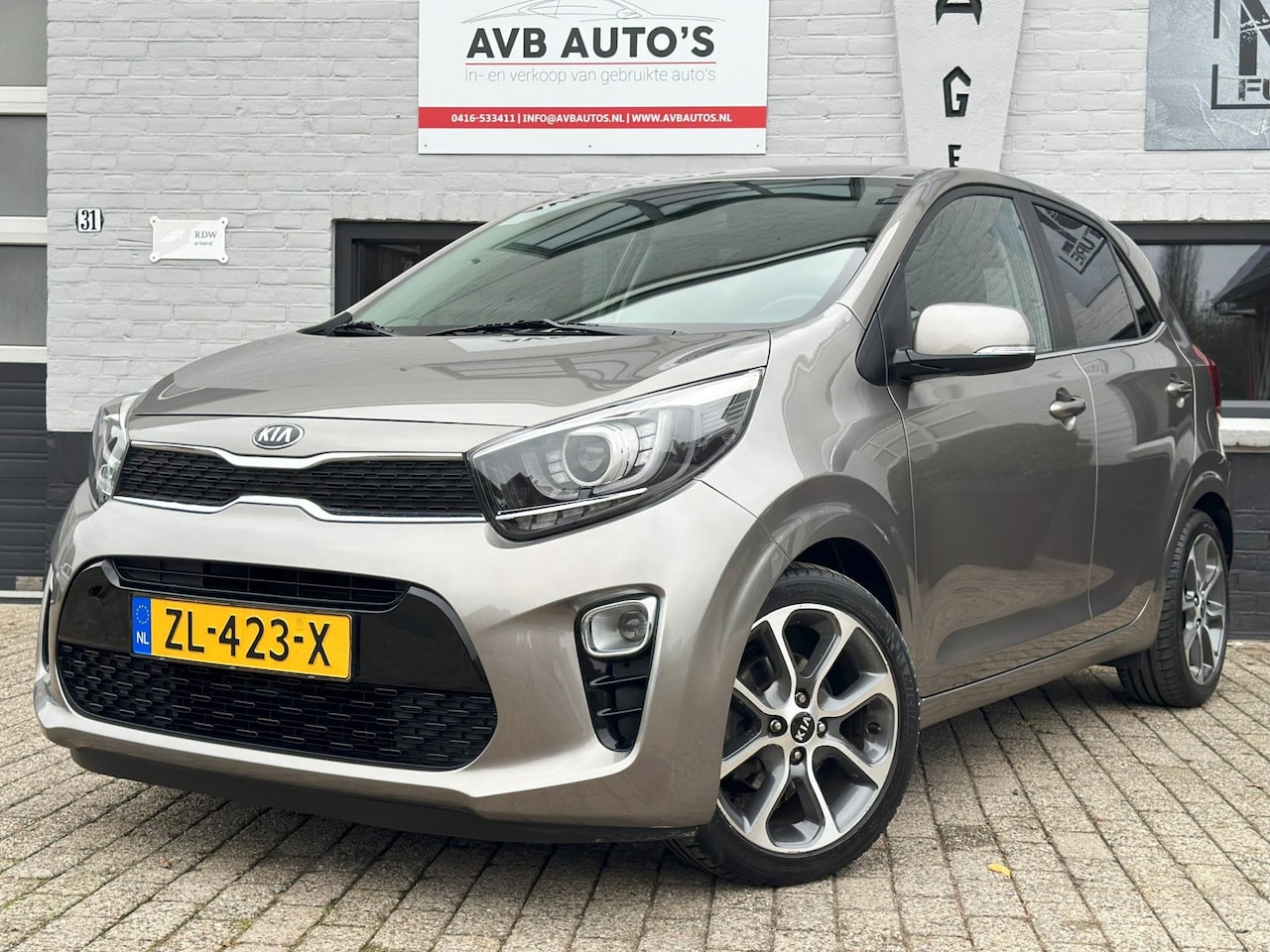 Kia Picanto - 1.0 CVVT Design Edition Clima Cruise Navi Camera - AutoWereld.nl