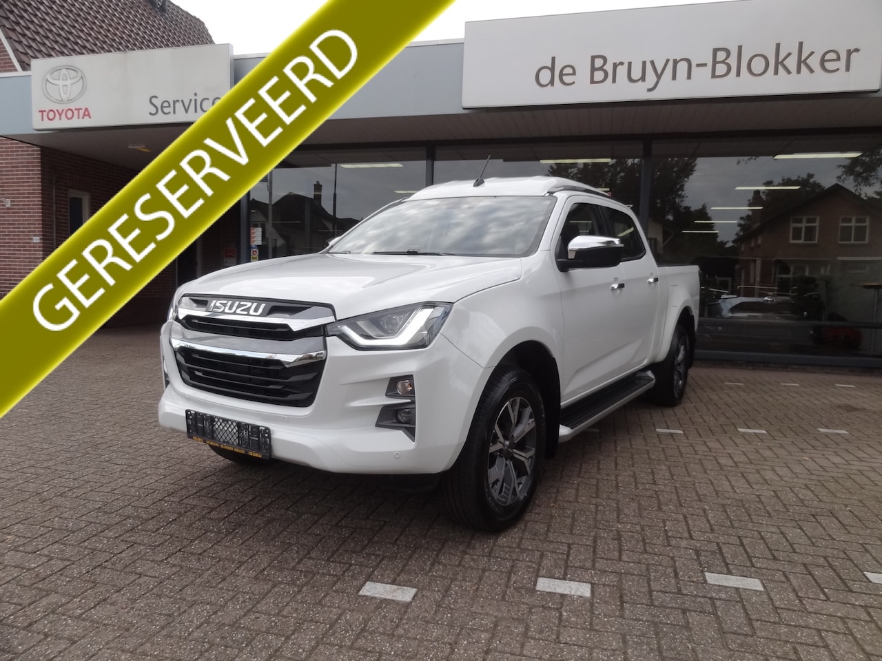 Isuzu D-Max - 1.9 Double Cab lang 5-persoons LSE Automaat Pearl White Metallic beperkt beschikbaar, in b - AutoWereld.nl