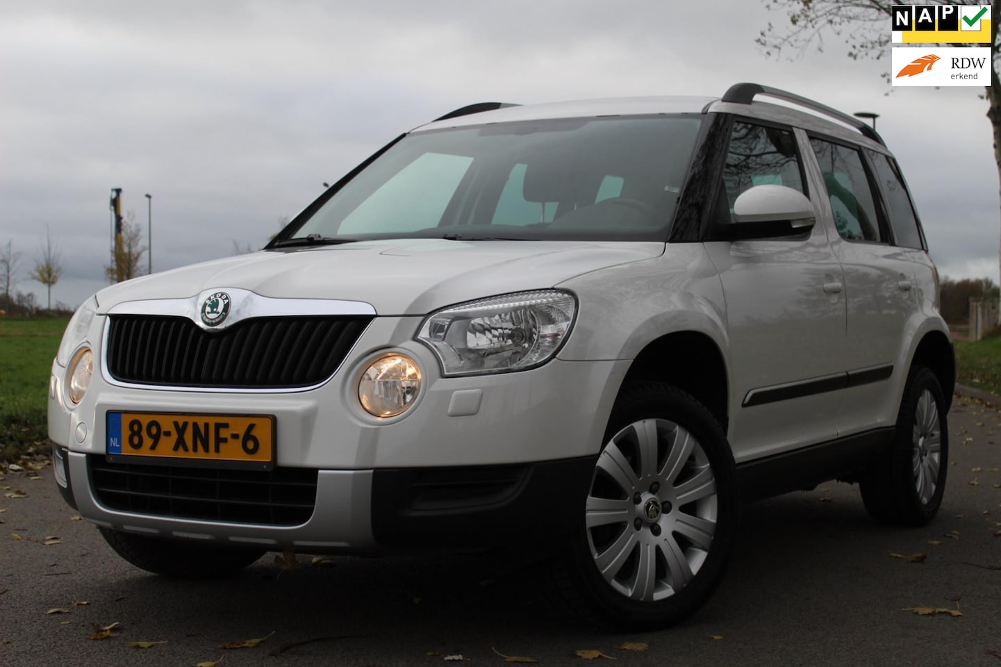 Skoda Yeti - 1.2 TSI Ambition Arctic 105 pk | HOGE ZIT | CLIMATE CONTROLE | CRUISE CONTROLE | NAVIGATIE - AutoWereld.nl