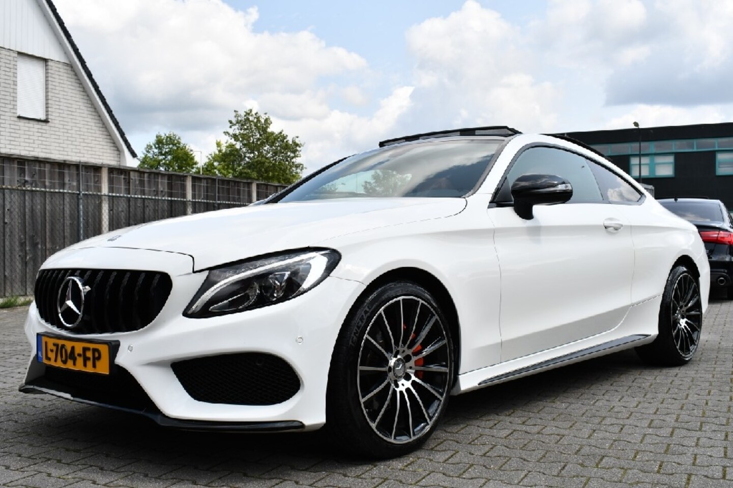 Mercedes-Benz C-klasse Coupé - 220d AMG Panodak|Keyless|19" - AutoWereld.nl