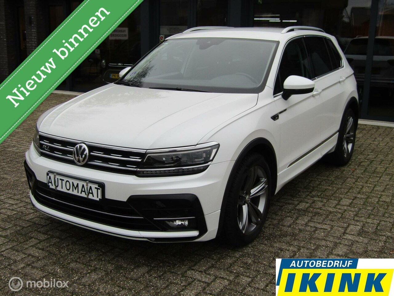 Volkswagen Tiguan - 1.4 TSI ACT Highline R-line - AutoWereld.nl