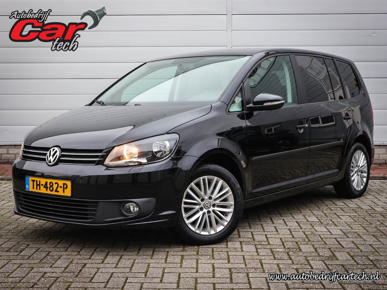 Volkswagen Touran - 1.6 TDI Comfortline BlueMotion 7p. | Airco | Navi | Cruise | Lichtmetaal | 7 Persoons | Mi - AutoWereld.nl