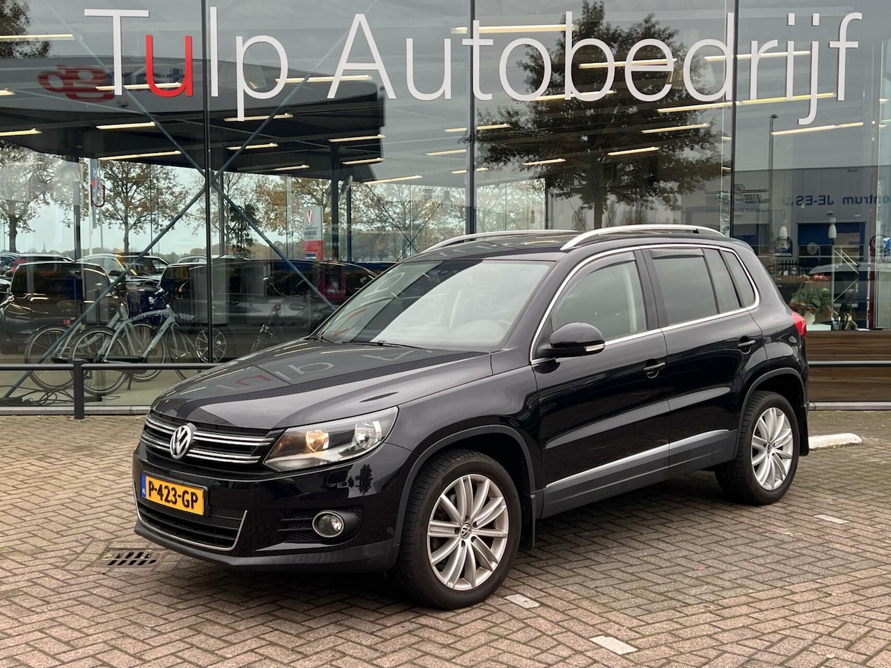 Volkswagen Tiguan - 1.4TSI Sport&Style 4Motion Airco Clima Nav - AutoWereld.nl