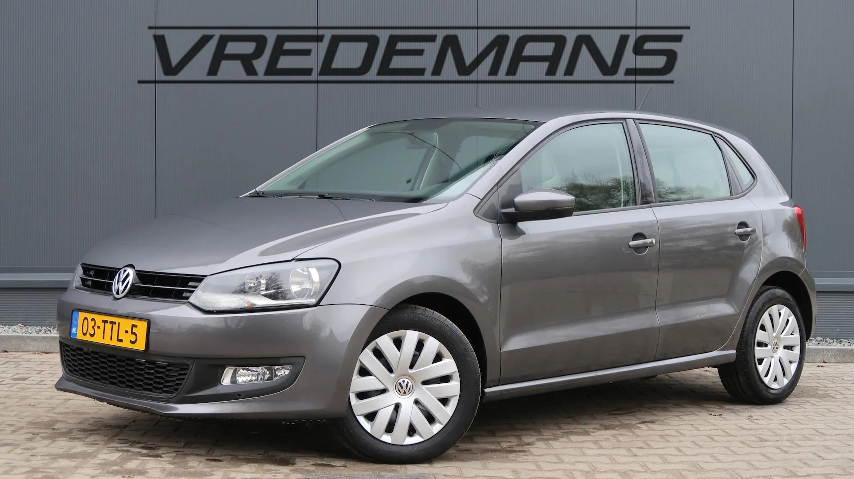 Volkswagen Polo - 1.2 TSI Comfortline AUTOMAAT/CLIMA - AutoWereld.nl