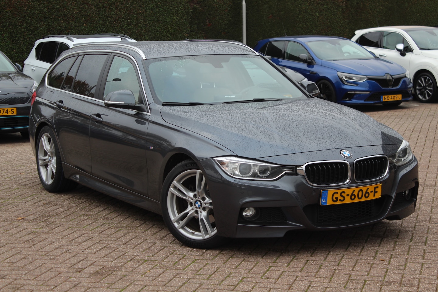 BMW 3-serie Touring - 320i High Exe. M Sport / Leder / Navigatie / Parkeerhulp V+A / Stoelverwarming / Cruise Co - AutoWereld.nl