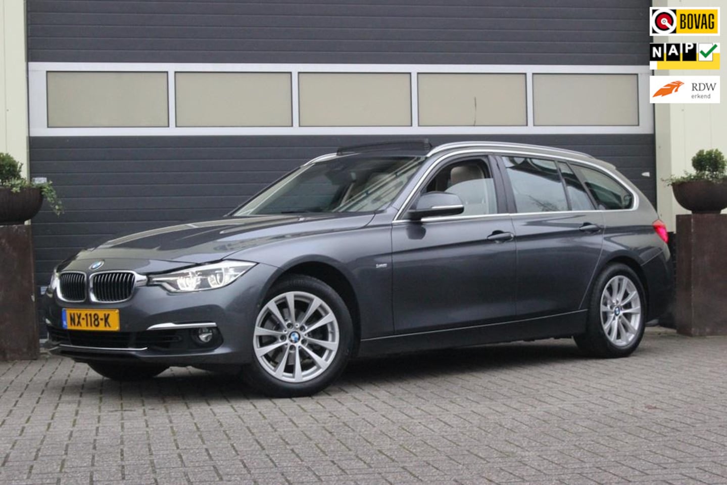 BMW 3-serie Touring - 320i High Executive | Panoramadak | Surround view | - AutoWereld.nl