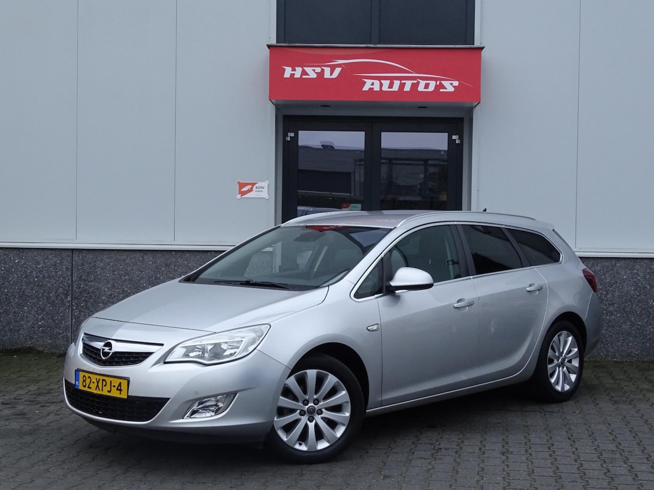 Opel Astra Sports Tourer - 1.4 Cosmo airco LM navi org NL - AutoWereld.nl