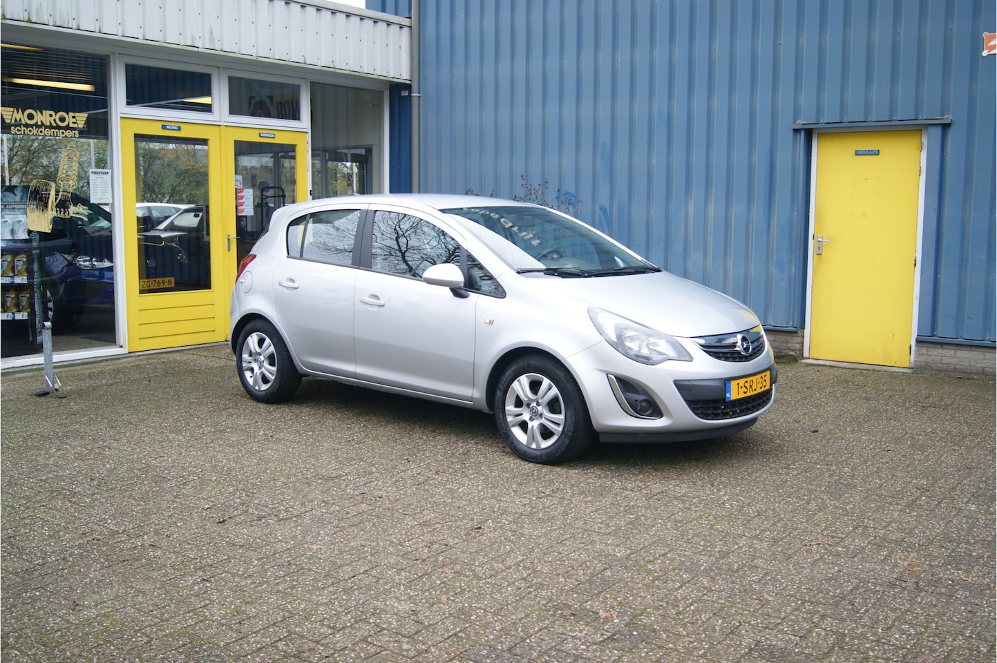 Opel Corsa - 1.4-16V Design Edition 1.4-16V Design Edition, Airco, Navi, Trekhaak!!! - AutoWereld.nl